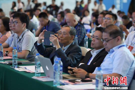 研討會現(xiàn)場圖?！■暮陚?攝