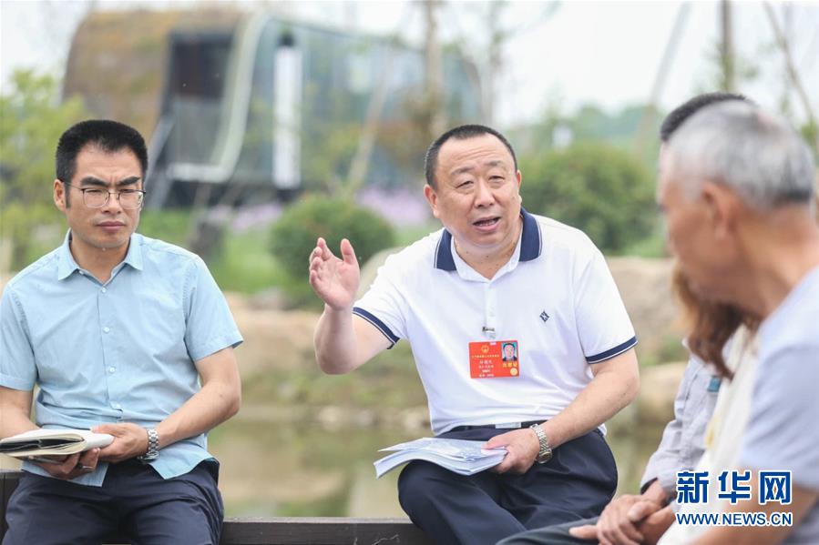 （新華全媒頭條·兩會精神看落實·圖文互動）（2）整體謀劃、系統(tǒng)升級、全面提升——落實全國兩會精神織牢織密公共衛(wèi)生防護(hù)網(wǎng)