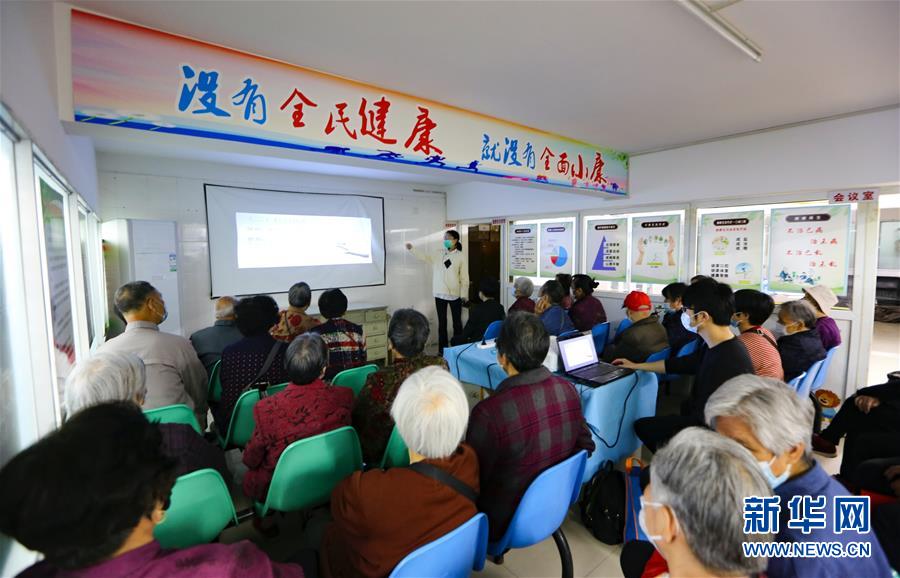 （新華全媒頭條·兩會精神看落實·圖文互動）（3）整體謀劃、系統(tǒng)升級、全面提升——落實全國兩會精神織牢織密公共衛(wèi)生防護(hù)網(wǎng)