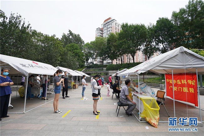 （新華全媒頭條·圖文互動）（5）首都再戰(zhàn)“疫”，難忘40天——寫在北京應(yīng)急響應(yīng)級別降級之際 